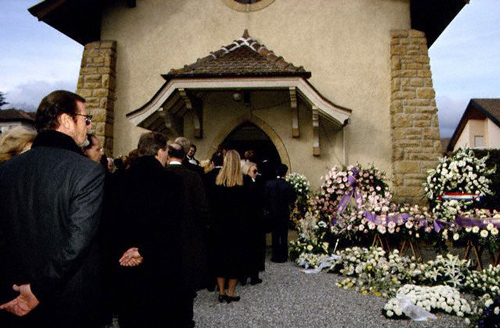 Roger Moor entering the church