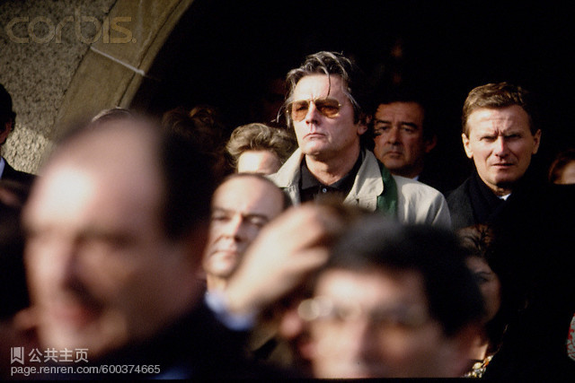 Alain Delon leaving the church